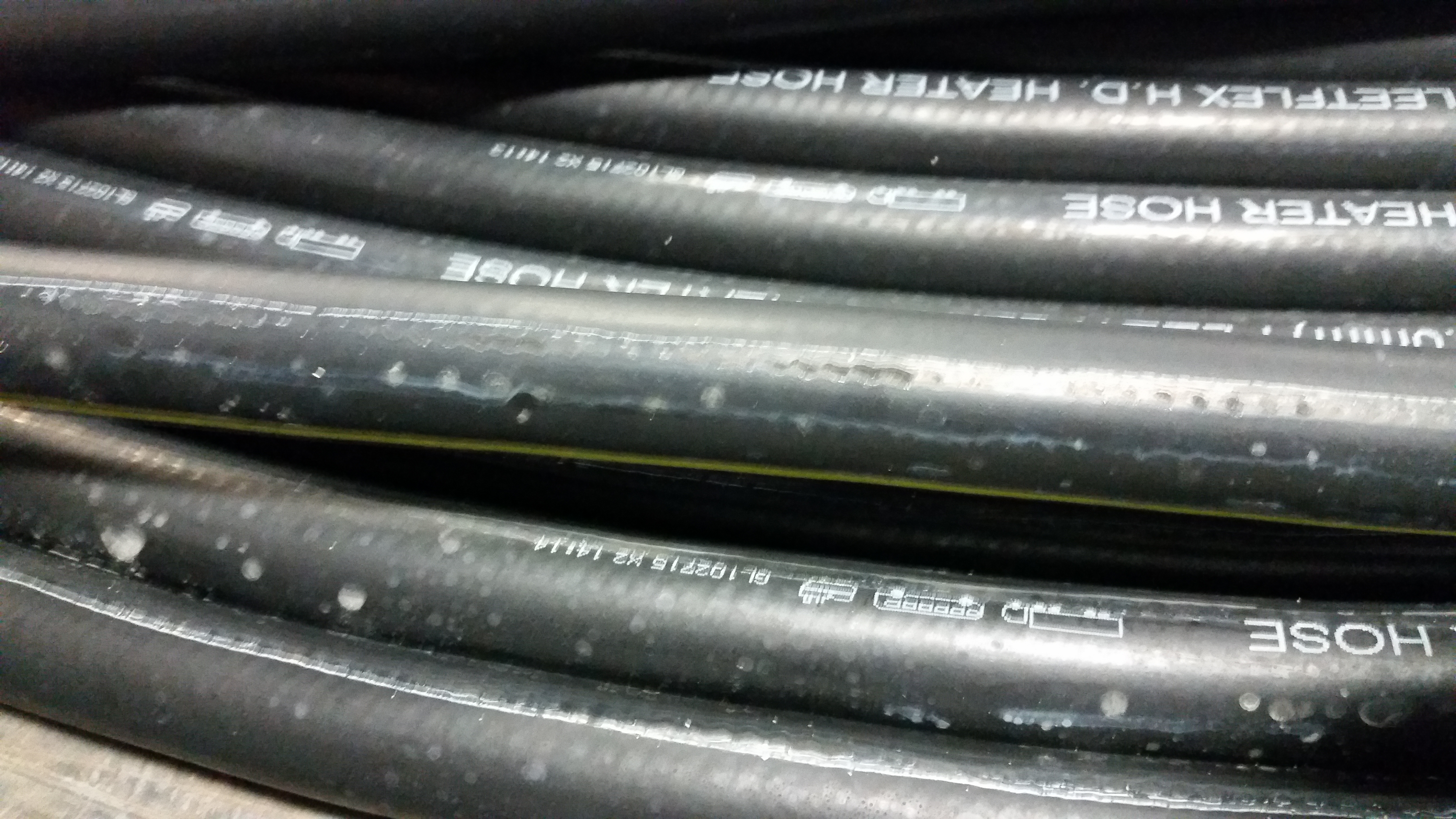 Rubber tubing with white numbers and letters on it