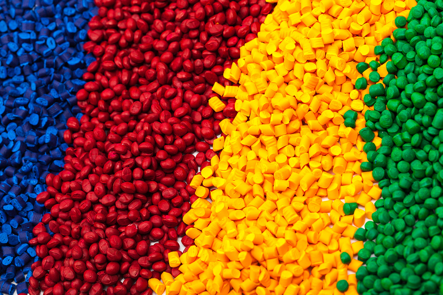 Four colors of plastic pellets.