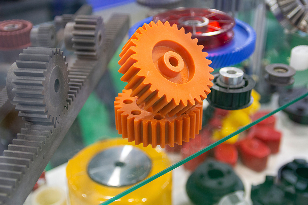 A number of colorful gears molded from plastic and rubber