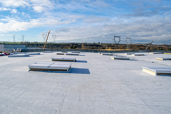 A flat roof created with extruded EPDM rubber roof tiles