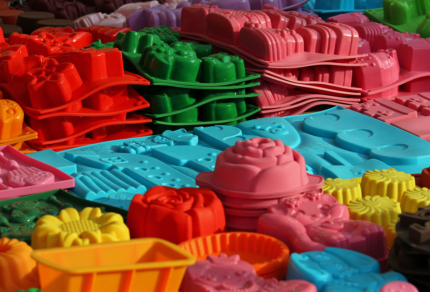 A wide variety of silicone food molds in assorted colors