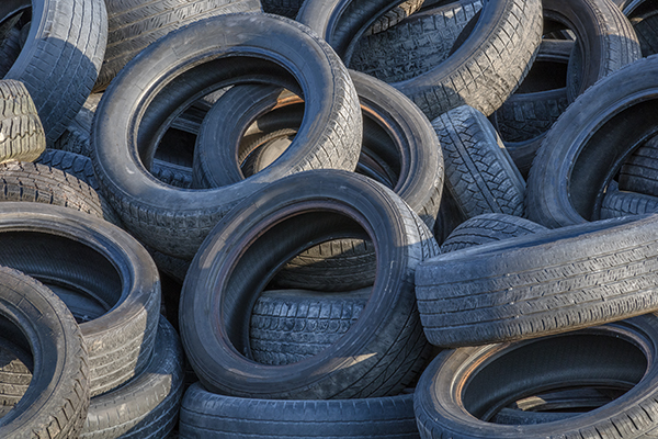 A pile of black rubber tires